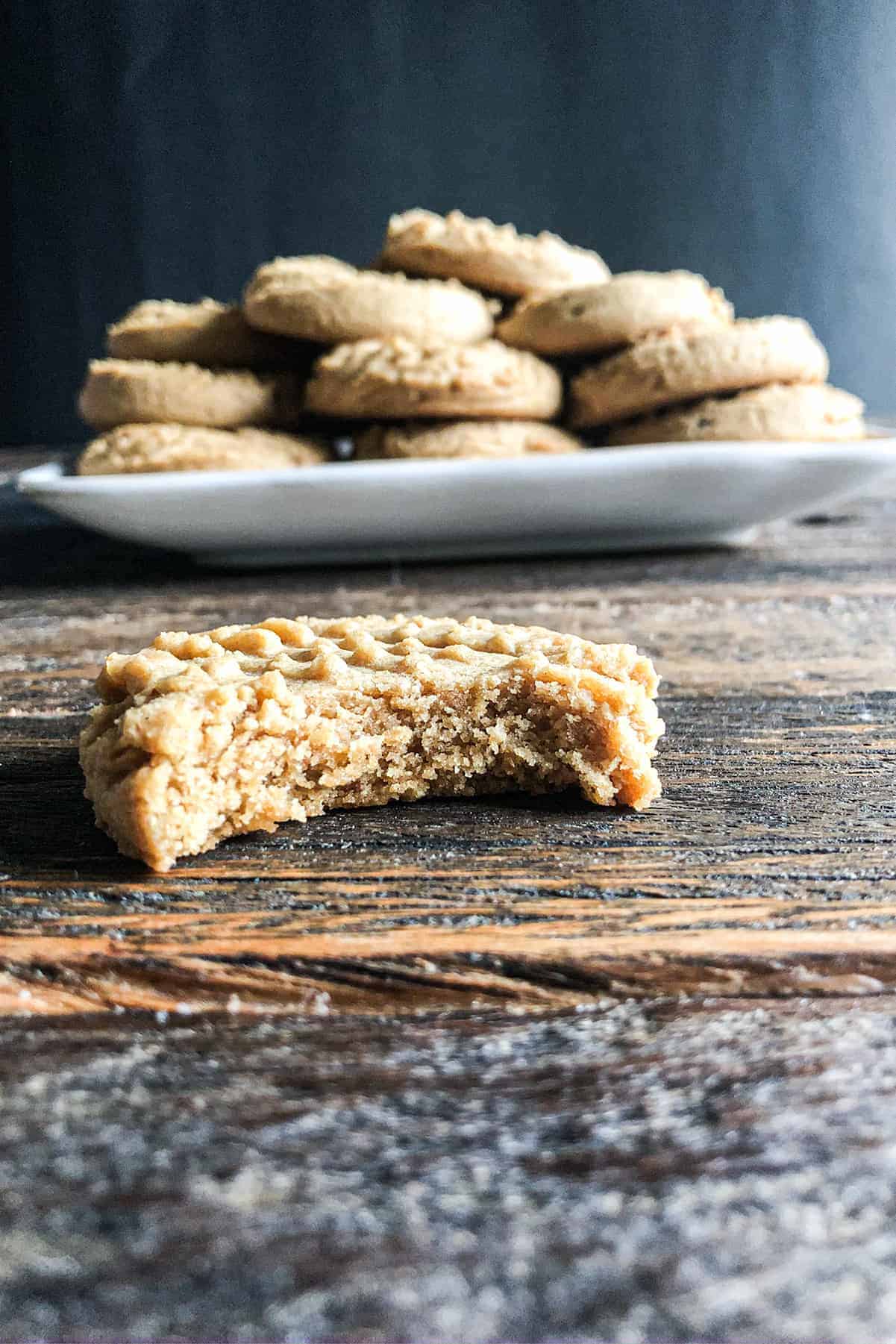 Peanut butter cookie with a bite out.