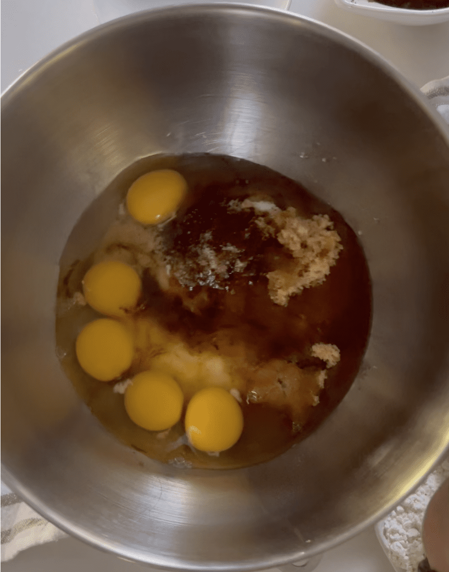 sugar, brown sugar, eggs, espresso powder, and vanilla mixed together